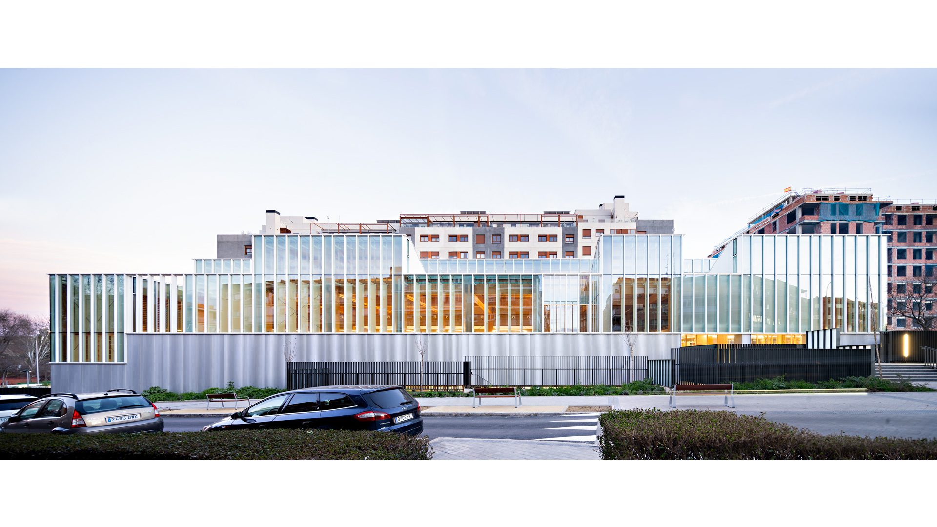 Bioclimatic architecture at sunset with wooden and exterior curtain wall at the Francisco Umbral Library in Madrid
